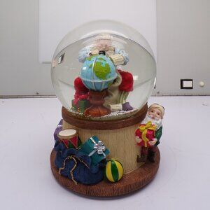 Santa Checking His List Snow Globe Music Box